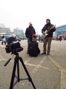 Busking for our breakfast Guiyang christmas 2012